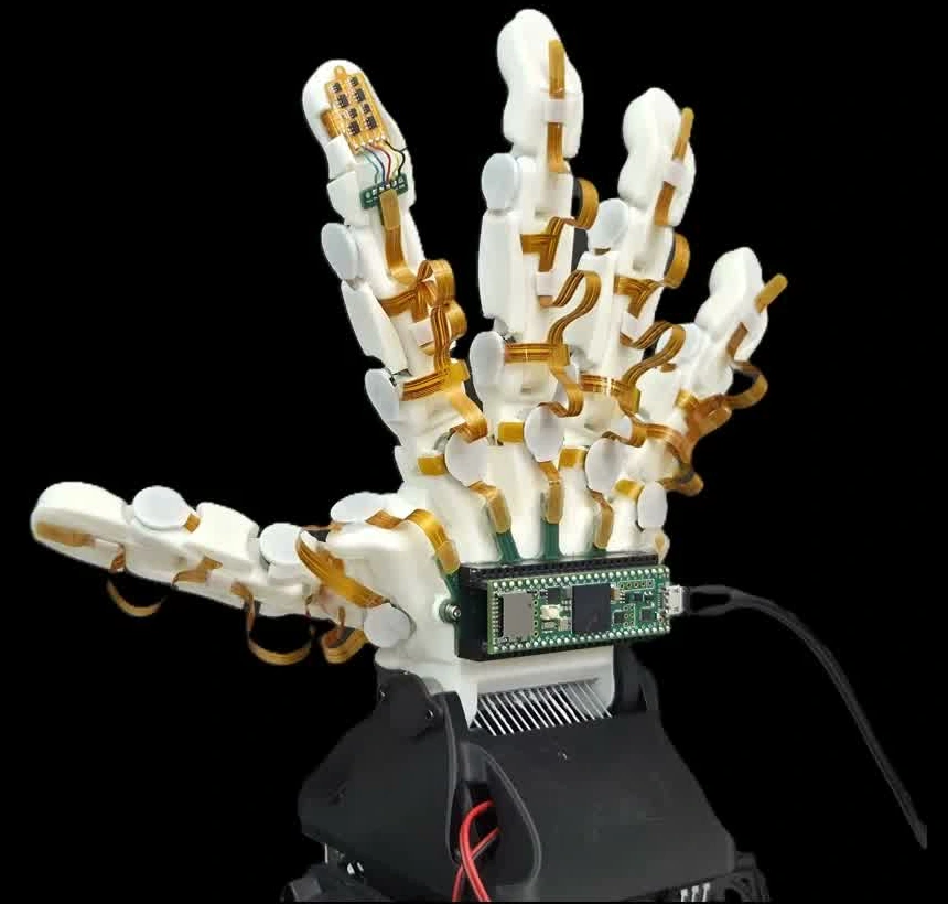 ORCA robotic hand with integrated joint-angle and tactile sensors and a wrist-mounted interface board